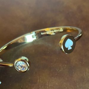 Gold, rhinestone Kate Spade branded cuff bracelet